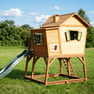 Whimsical Raised Wooden Playhouse with Slide | Custom Kids Backyard Treehouse Factory
